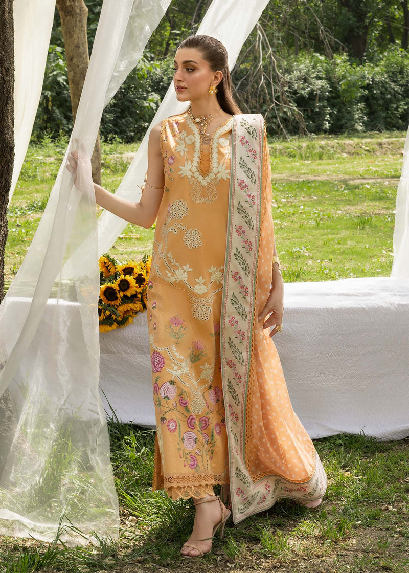 Woman in a traditional outfit with floral patterns standing outdoors.