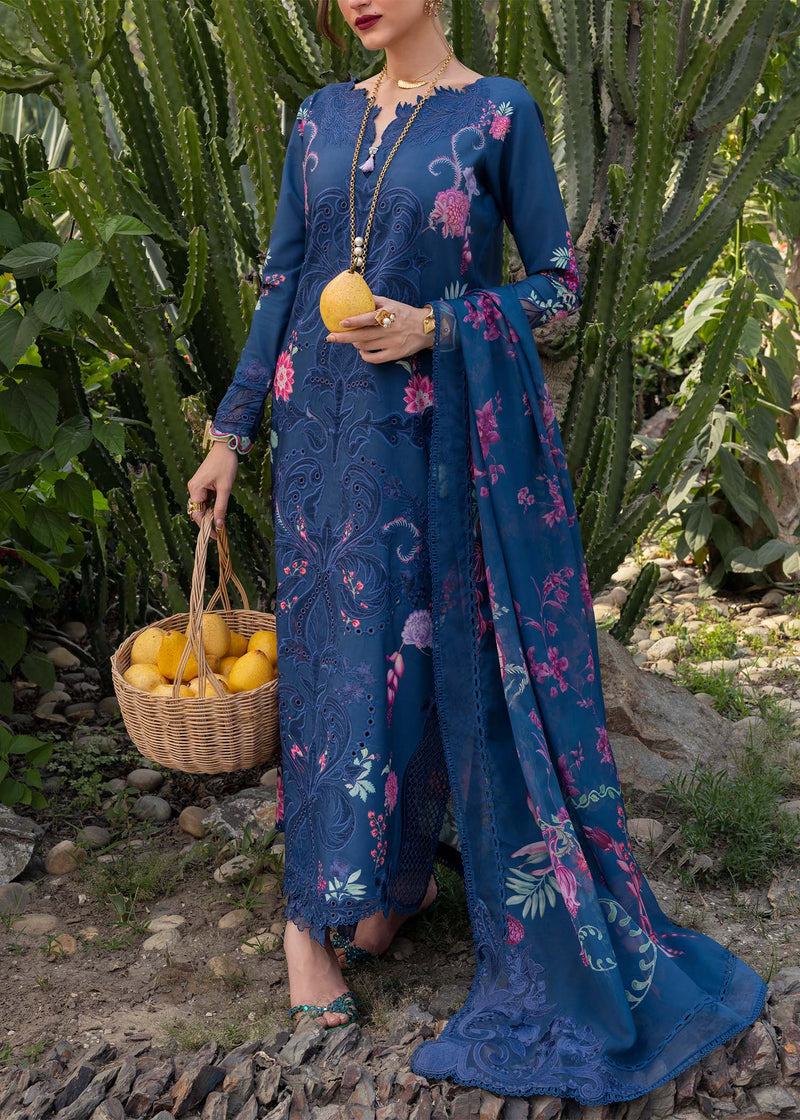 Woman in a blue floral dress holding a basket of lemons in a garden setting