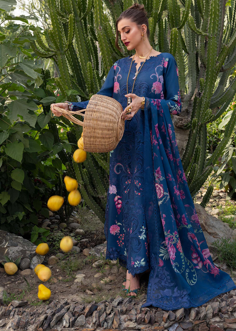 Woman in a blue floral dress holding a woven basket amidst greenery and lemons.