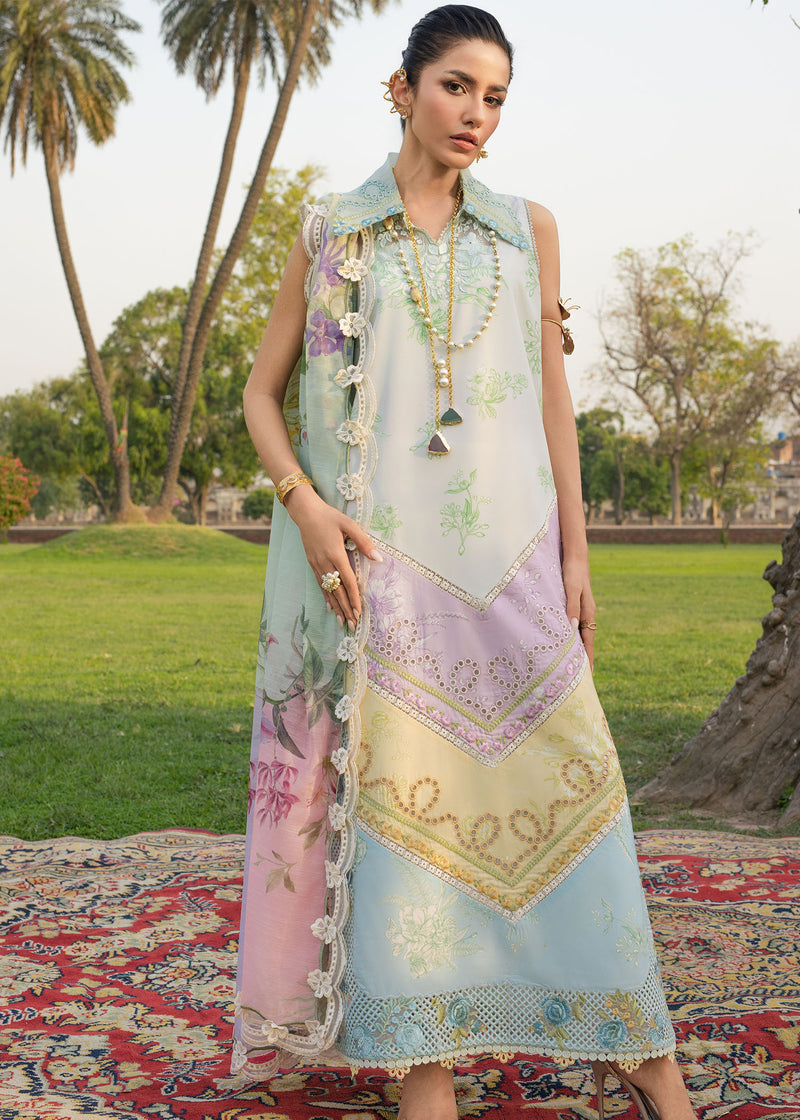 Woman wearing a traditional outfit with a floral design in an outdoor setting