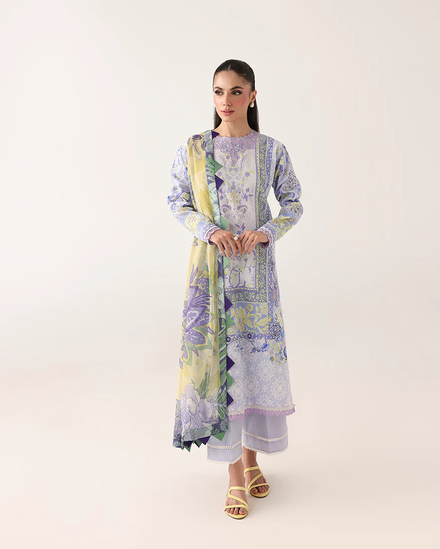 Woman wearing a floral dress with a scarf on a white background