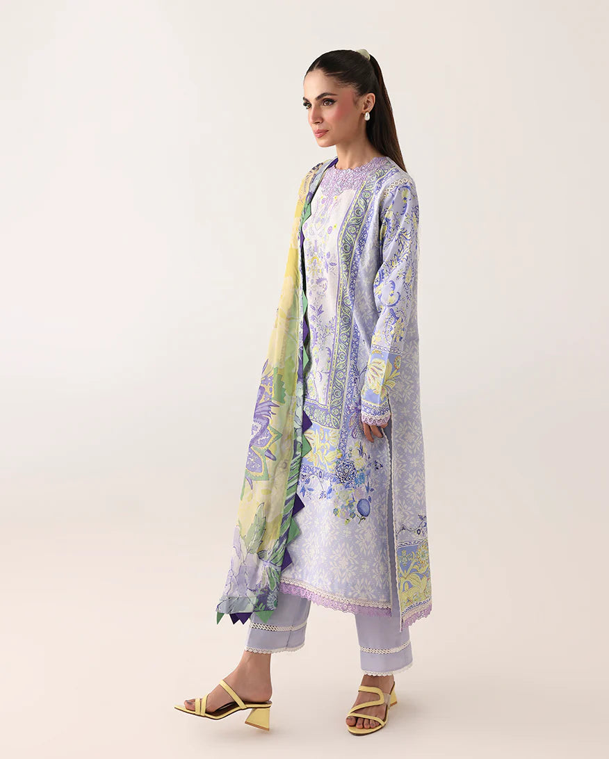 Woman wearing a floral kurta with a matching dupatta on a white background