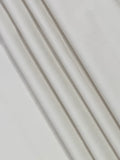 Close-up of white fabric with visible texture