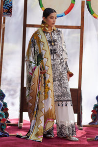 Woman in traditional attire with a colorful scarf against a decorative background