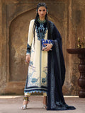 A woman models a traditional South Asian salwar kameez suit set. The outfit features a cream-colored kurta with intricate blue and silver embroidery, paired with a navy blue dupatta and matching embroidered border.