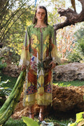 Woman in a colorful dress standing in a natural setting