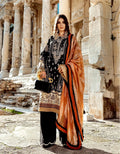 Woman in traditional outfit standing in front of ancient stone architecture