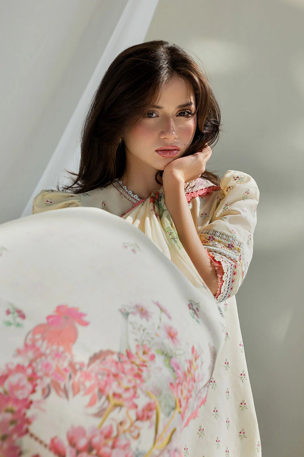 Woman in a floral dress with a blurred background
