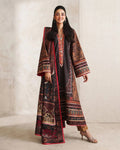 A woman models a traditional South Asian outfit consisting of a dark brown printed kurta with red borders and a matching printed jacket, set against a neutral textured beige background.