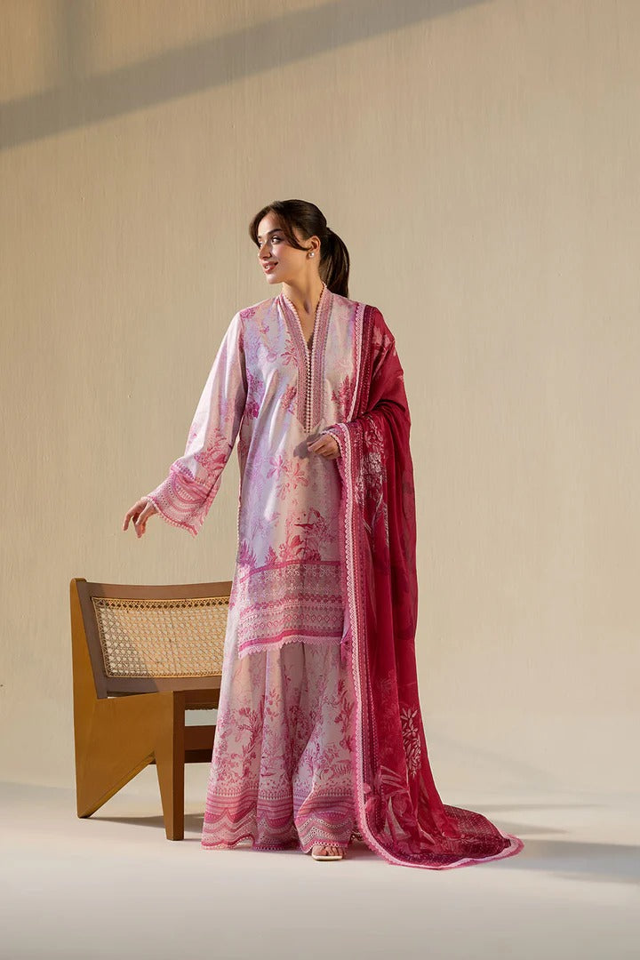 Woman wearing a pink and white traditional outfit with a long scarf against a neutral background