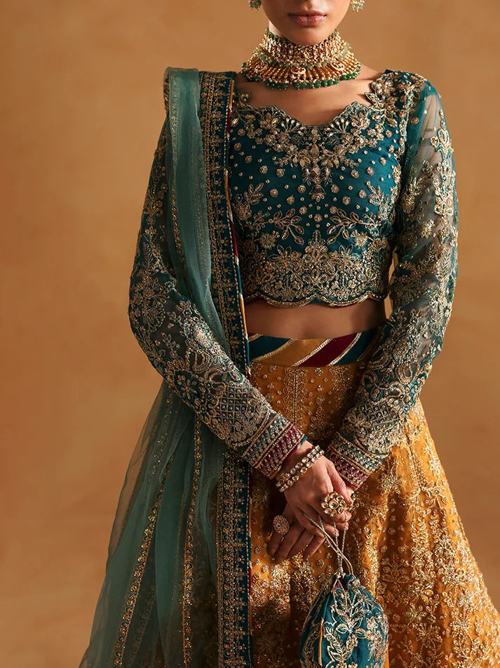 Traditional embroidered outfit with a focus on intricate designs and jewelry against a warm background.