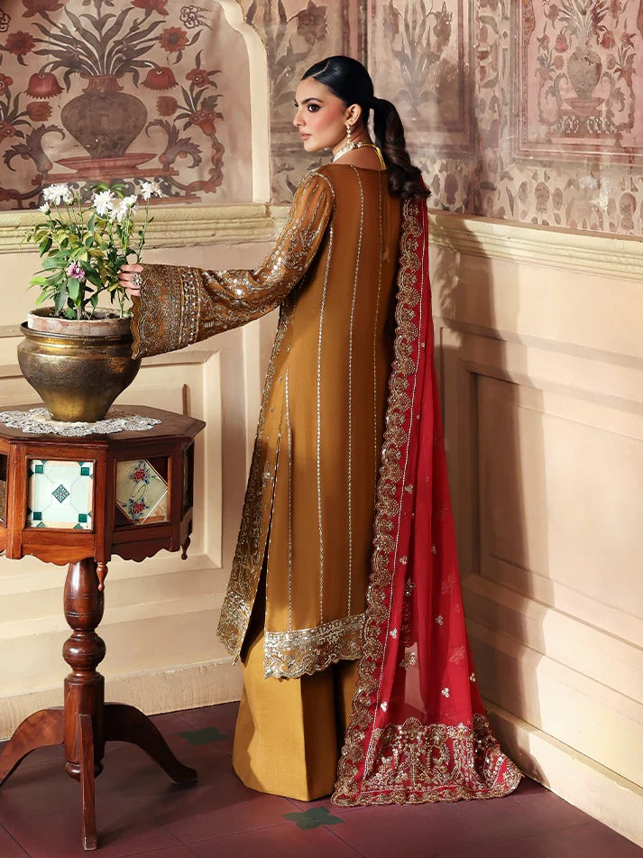 Woman in traditional outfit holding a plant in an ornate room