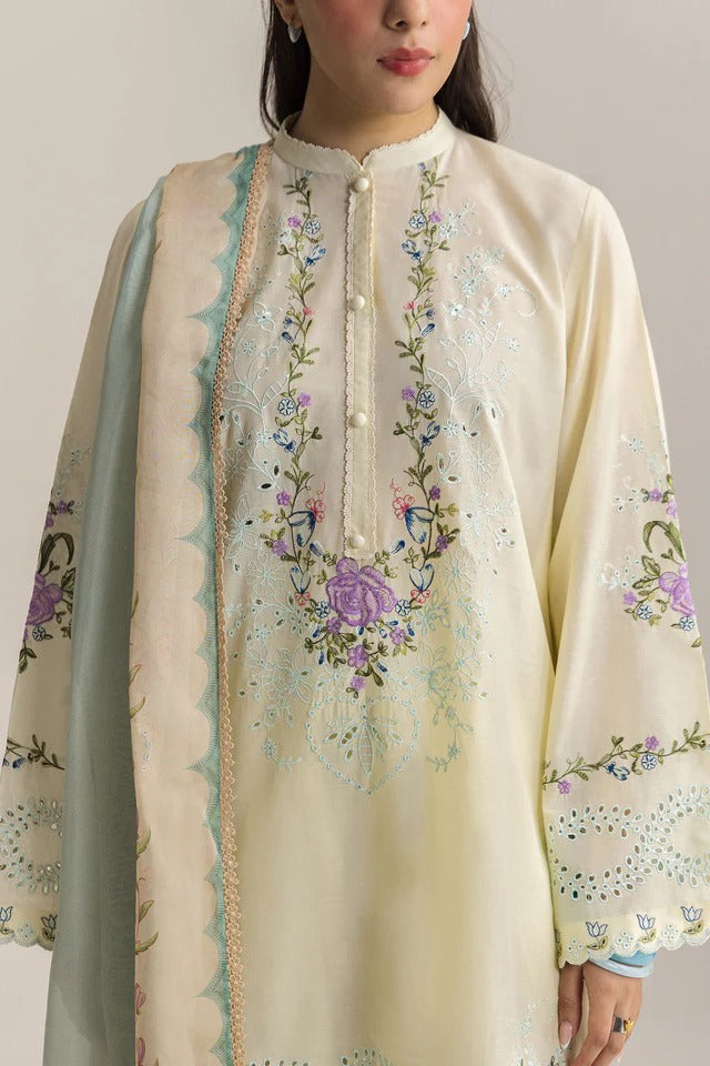 Beige embroidered kurta with floral patterns on a plain background