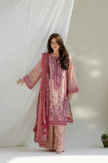 Woman wearing a traditional outfit with a pink and red dupatta against a white background