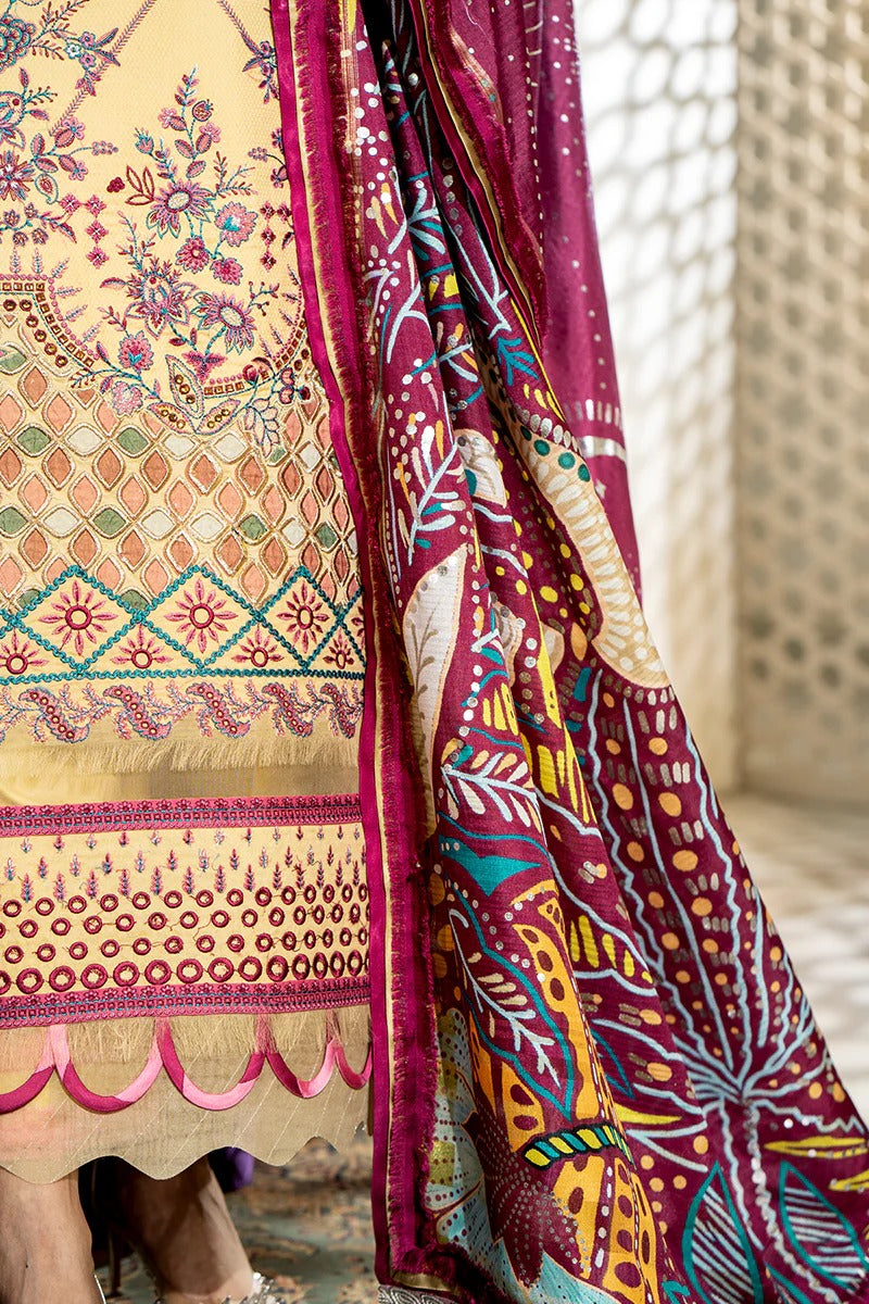 Colorful embroidered fabric with intricate patterns on a neutral background