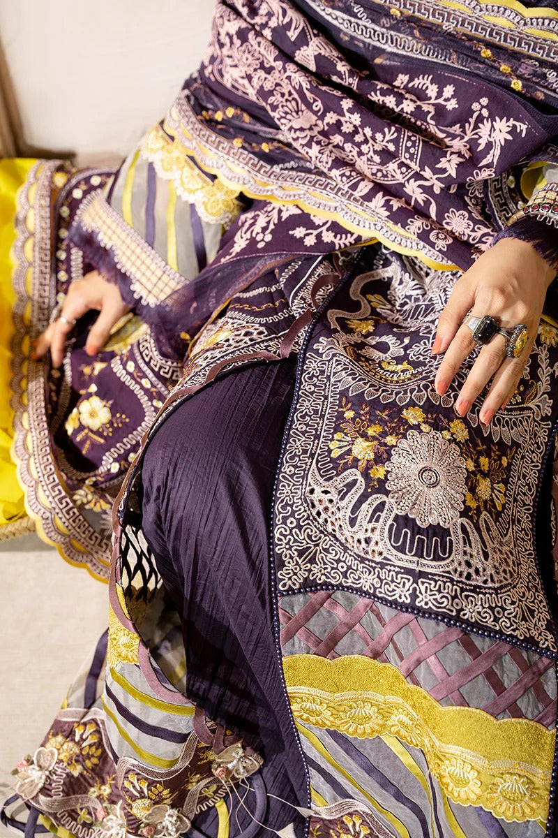 Close-up of a person wearing a patterned outfit with a focus on the fabric design.