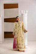 A woman models a traditional long cream-colored embroidered kurta with a matching pink dupatta, standing in a minimalist interior with white columns and brown accent walls.