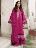 A woman modeling a magenta pink embroidered kurta set with matching trousers, standing on stone steps against a weathered concrete wall.