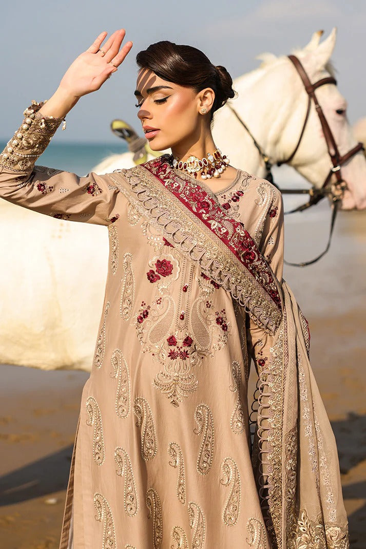 Woman in traditional embroidered outfit with a horse in the background