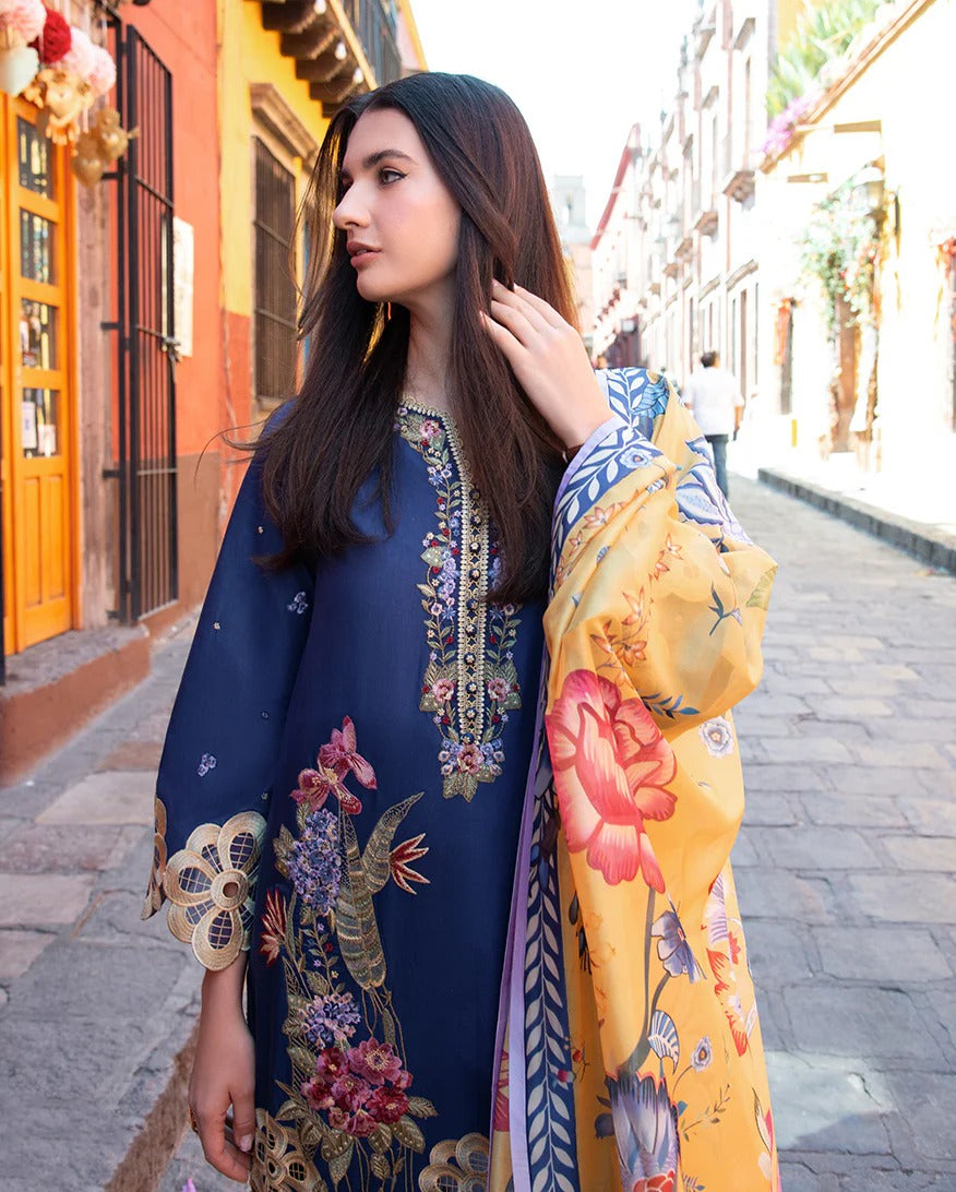 Woman wearing a colorful embroidered dress on a street