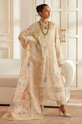 Woman wearing a floral dress with a matching shawl in a elegant room.