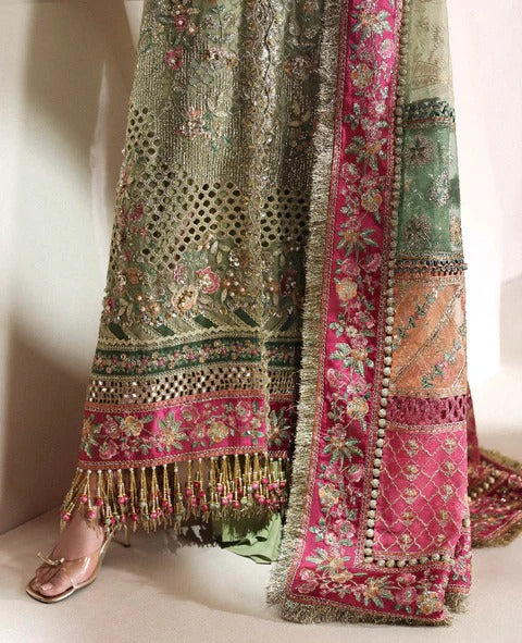 Decorative fabric with intricate patterns and embroidery on a plain background