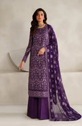 Woman wearing a purple embroidered traditional outfit with a matching dupatta on a neutral background
